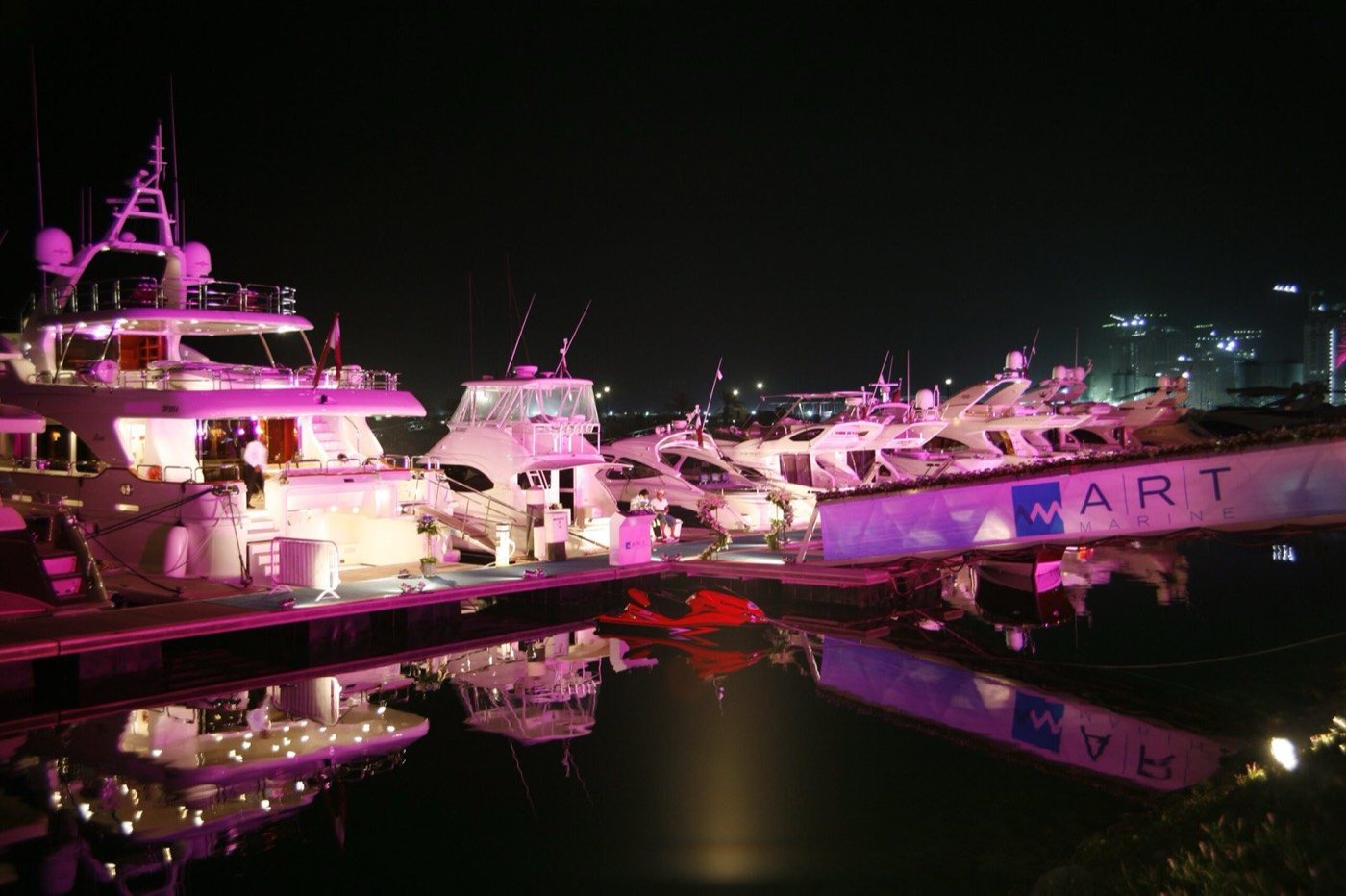 Illuminated yachts at the Art Marine launch in Doha